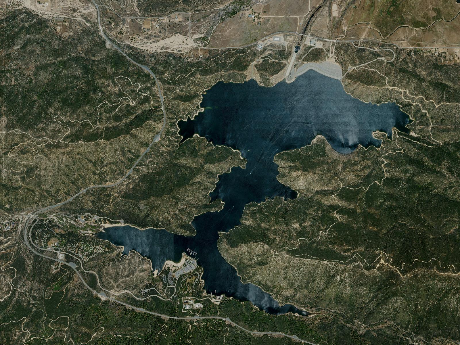 North-up aerial view of Silverwood Lake, showing its shoreline, surrounding hills and southern recreation areas.